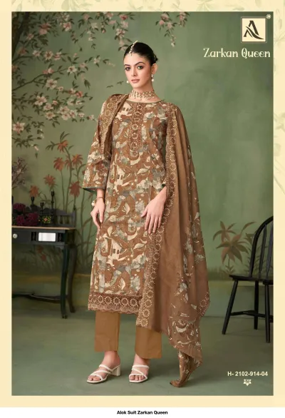 Alok Suit Zarkan Queen: Brown patterned salwar suit featuring floral and geometric motifs with intricate embroidery on the hem and neckline.