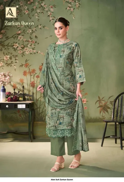 Alok Suit Zarkan Queen: Green printed salwar suit with straight-cut kurti, matching trousers, and a dupatta with detailed embroidered border.