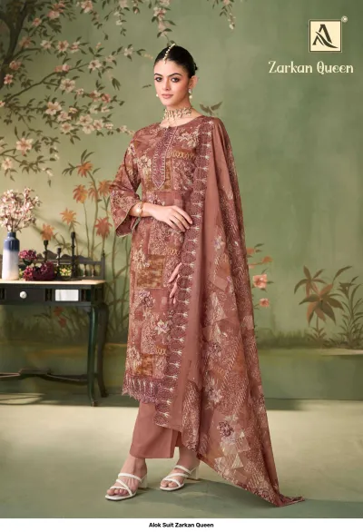 Alok Suit Zarkan Queen: Brown printed salwar suit with straight-cut kurti, matching trousers, and a dupatta featuring embroidered scalloped edges.