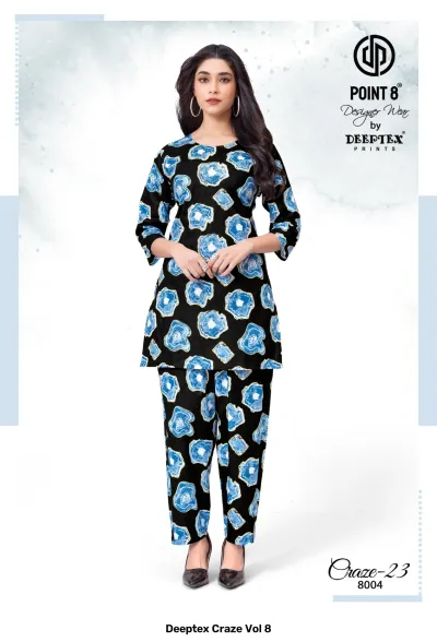 Deeptex Craze Vol 8: A black kurti and pant set featuring blue abstract stone-like prints.