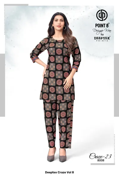 Deeptex Craze Vol 8: A black kurti and pant set with circular medallion prints.