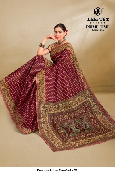 Deeptex Prime Time Vol – 21 maroon and olive printed cotton saree with a heavy patterned pallu and small motifs.