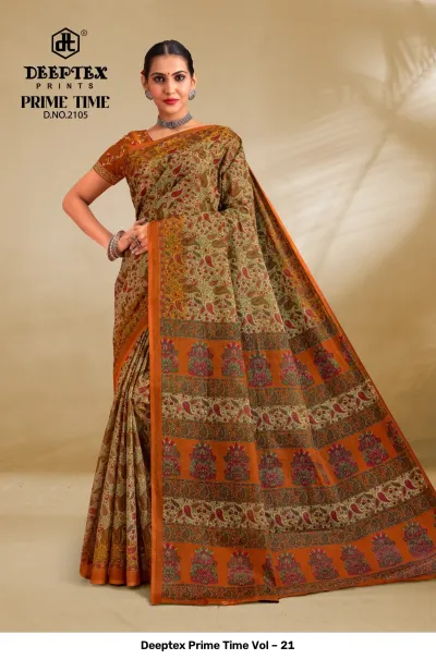 Deeptex Prime Time Vol – 21 olive green and orange printed cotton saree with paisley patterns and a wide patterned border.