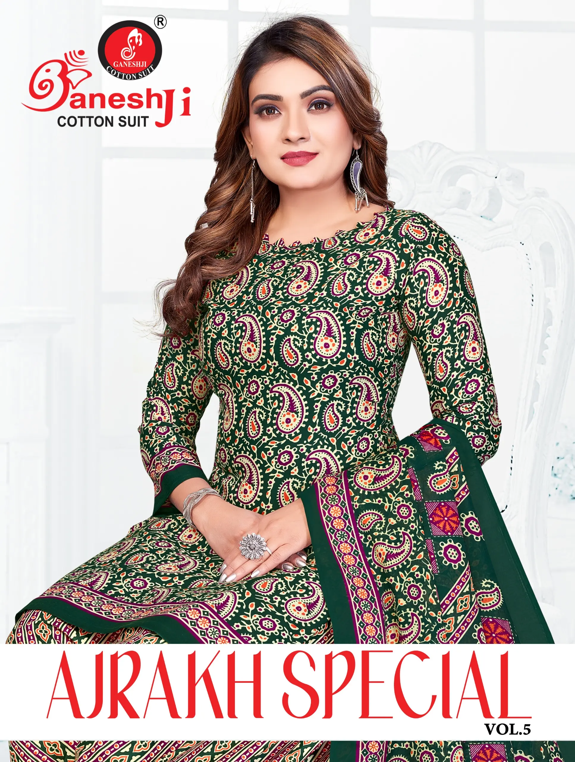 Ganeshji Ajrakh Special Vol 5. A model wearing a dark green salwar suit with paisley block prints and a matching dupatta.