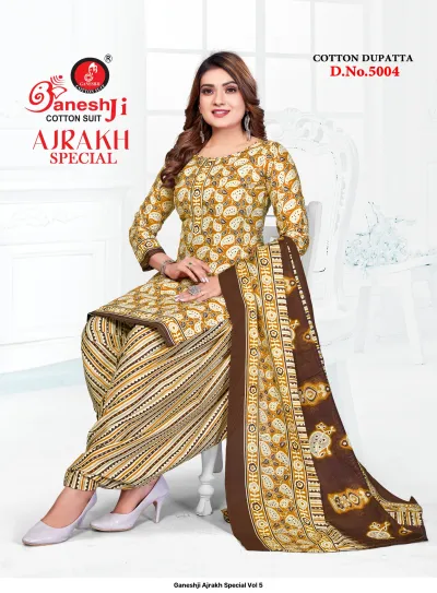 Ganeshji Ajrakh Special Vol 5. A model in a mustard yellow salwar suit with paisley prints and a brown dupatta.