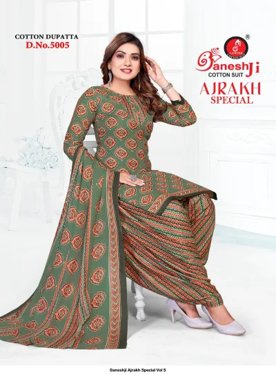 Ganeshji Ajrakh Special Vol 5. A model in a sage green salwar suit with orange block prints and geometric patterns.