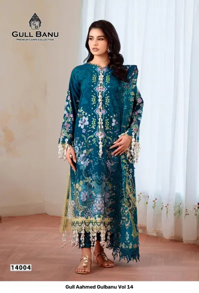 Gull Aahmed Gulbanu Vol 14: Teal blue lawn salwar suit with detailed floral embroidery, thread work, and decorative hanging embellishments on the hem.