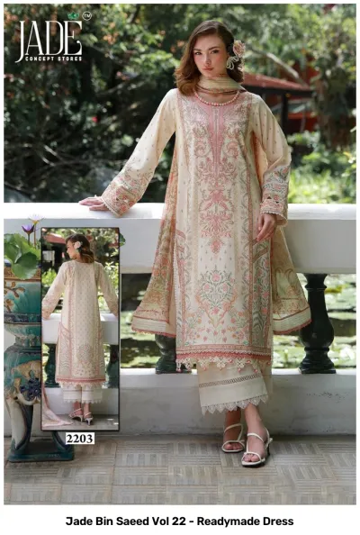 Jade Bin Saeed Vol 22 - Readymade Dress: A woman wearing a light beige printed kurti and palazzo set with pastel floral patterns and lace trim.