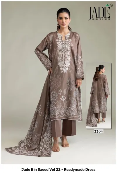 Jade Bin Saeed Vol 22 - Readymade Dress: A model in a taupe brown printed cotton suit, featuring elaborate white thread work embroidery and patterns.