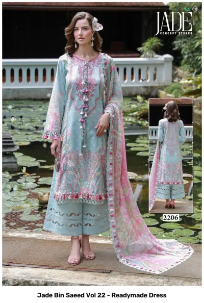 Jade Bin Saeed Vol 22 - Readymade Dress: A woman in a light blue printed kurti and palazzo suit, featuring floral patterns and tassel embellishments.