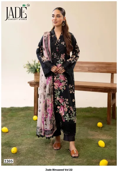 Jade Binsaeed Vol 22, black cotton salwar suit with vibrant floral prints, embroidered lace borders, and a decorative printed dupatta.