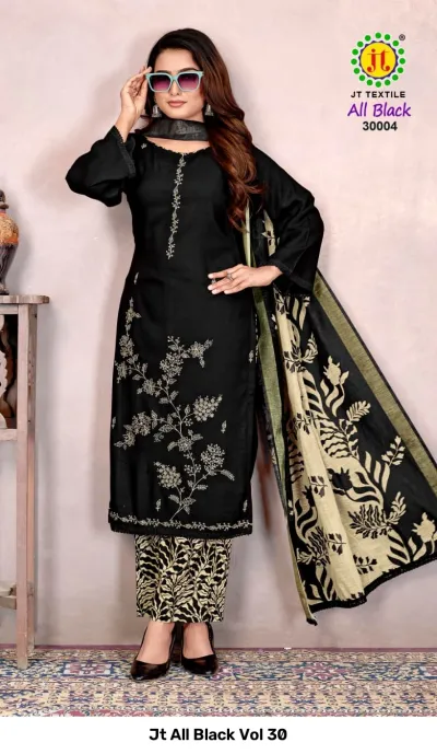 Jt All Black Vol 30, a model modeling a black salwar suit with intricate floral thread work embroidery paired with printed trousers and dupatta.