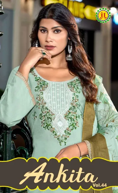 Jt Ankita Vol 44: Close-up of a mint green salwar suit with intricate floral thread embroidery and zari work on the neck yoke.