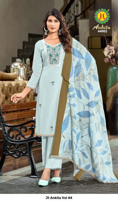 Jt Ankita Vol 44: Light blue salwar suit paired with a floral printed dupatta, featuring decorative thread work embroidery on the bodice.