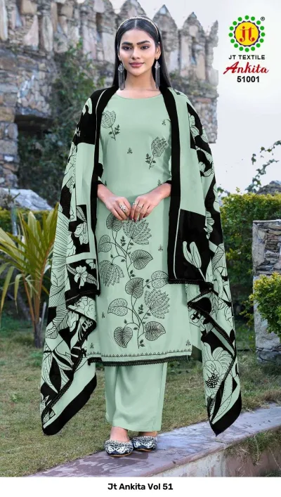 Jt Ankita Vol 51: A model wearing a light green salwar suit with black floral print, thread work details, and a matching patterned dupatta.