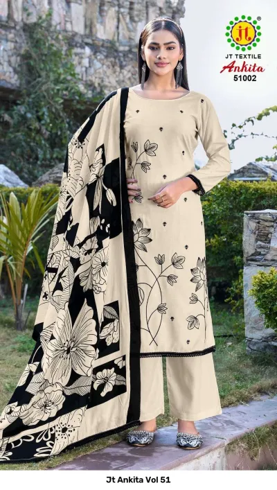 Jt Ankita Vol 51: A model wearing a cream-colored salwar suit featuring black floral embroidery and a matching printed dupatta.