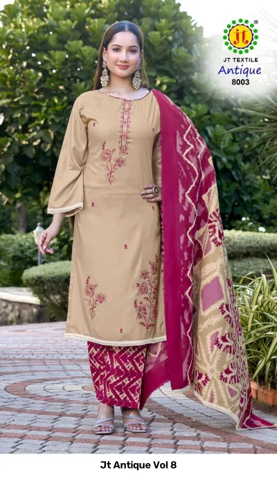 Jt Antique Vol 8: Beige kurti with floral thread work, paired with maroon printed palazzo pants and dupatta.