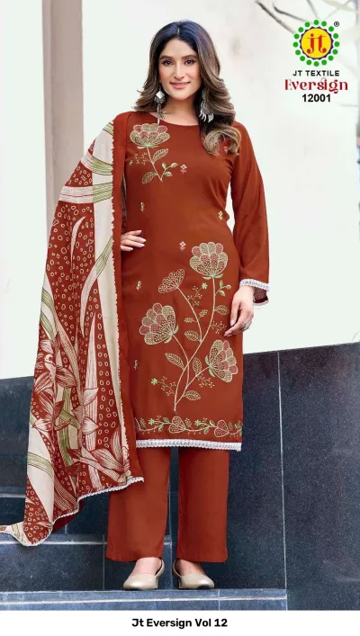 Jt Eversign Vol 12 rust-brown dress material with floral thread work embroidery and a matching printed beige and brown dupatta.