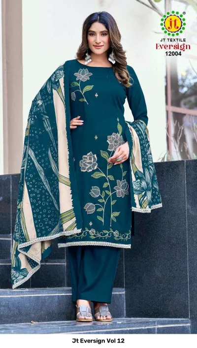 Jt Eversign Vol 12 teal dress material featuring floral thread work embroidery and a printed beige and teal dupatta.