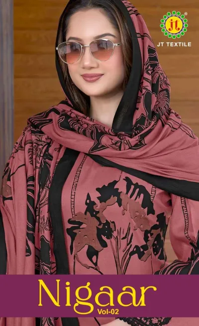 Jt Nigaar Vol 2: Model wearing a mauve and black printed suit with a dupatta and sunglasses.