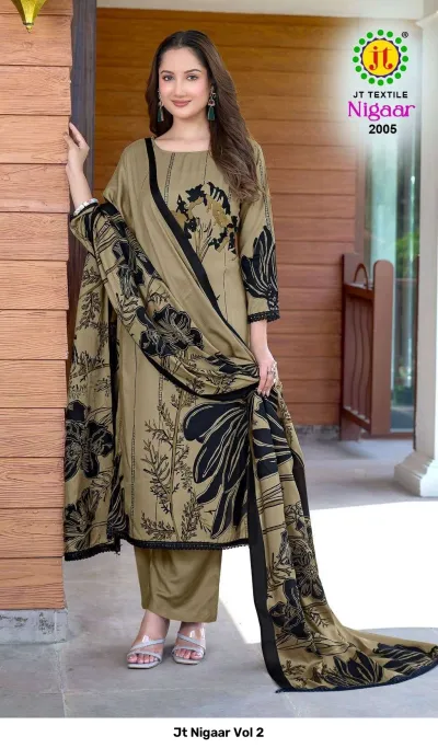 Jt Nigaar Vol 2: Olive green dress material set with black floral prints and black lace trim on the hem.
