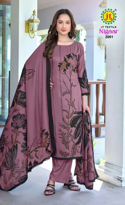 Jt Nigaar Vol 2: Mauve dress material set with black floral prints, lace edging, and a printed dupatta.