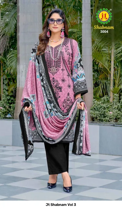 Jt Shabnam Vol 3: A model wearing a dusty pink salwar suit with black thread work embroidery, floral prints, and a matching dupatta.