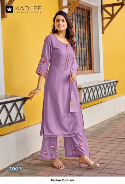Kadlee Roohani, light purple salwar suit with thread work neckline, small floral embroidery on kurti and hem, and a matching printed dupatta.