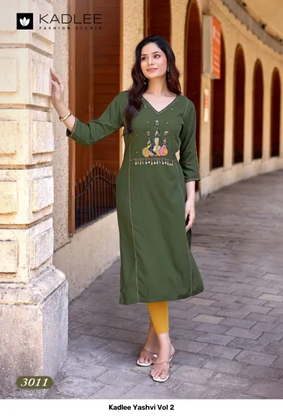 Kadlee Yashvi Vol 2: Olive green straight cut kurti with themed thread work embroidery on the chest and sleeves.