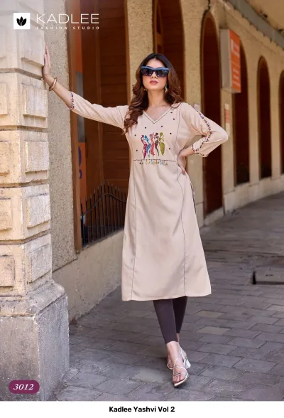 Kadlee Yashvi Vol 2: Beige straight cut kurti with themed thread work embroidery on the chest and sleeves.