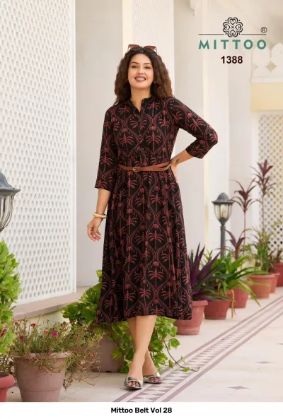 Mittoo Belt Vol 28, black kurti with palm tree print, mandarin collar, and a brown waist belt.