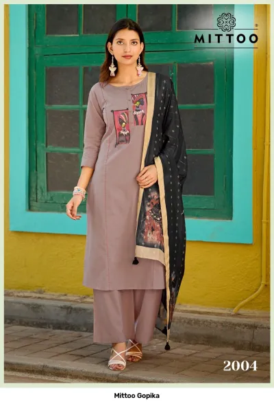 Mittoo Gopika: Teal kurti and palazzo set with a printed, mirror work chest patch and a printed dupatta.