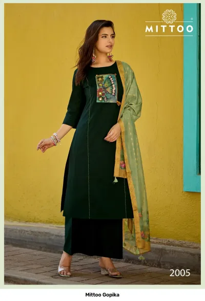 Mittoo Gopika: Dark red kurti and palazzo set with a printed chest patch and a patterned dupatta with a gold border.