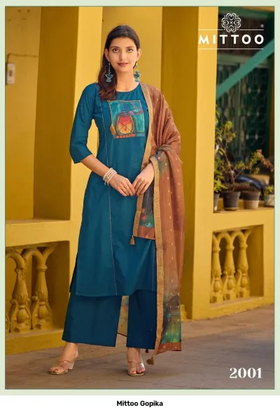 Mittoo Gopika: Grey kurti and palazzo set with a printed, rectangular chest patch and a black, printed dupatta.