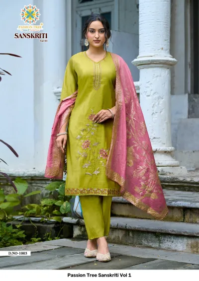 Passion Tree Sanskriti Vol 1: Light green salwar suit with floral thread embroidery, matching pants, and a pink zari work dupatta.