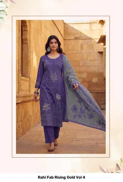Rahi Fab Rising Gold Vol 4: Purple salwar suit with floral thread work embroidery and a contrasting grey floral printed dupatta.