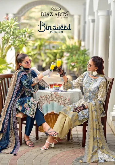 Riaz Arts Bin Saeed Premium catalog cover featuring women in floral printed salwar suits with thread work embroidery.
