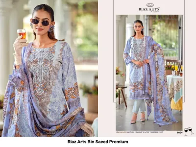Riaz Arts Bin Saeed Premium light blue and beige floral printed salwar suit with thread work embroidery and matching dupatta.