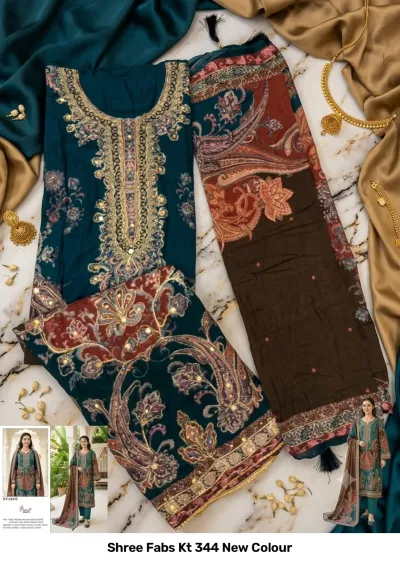Shree Fabs Kt 344 New Colour: teal blue kurti with paisley pattern, gold thread embroidery, mirror work, and a brown printed dupatta.