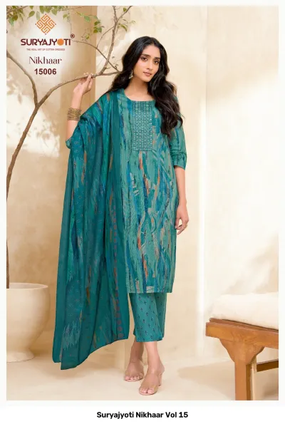 Suryajyoti Nikhaar Vol 15, teal abstract printed cotton salwar suit with neck embroidery, includes dupatta and matching printed pants.