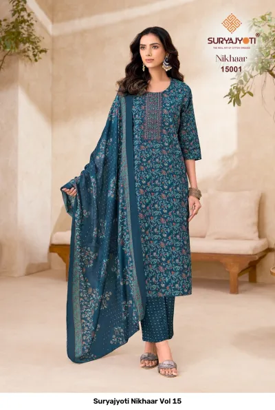 Suryajyoti Nikhaar Vol 15, teal floral printed cotton salwar suit with detailed neck thread work, includes dupatta and printed bottom.