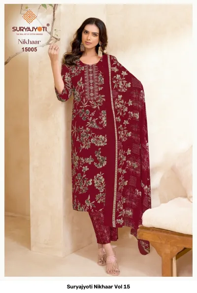 Suryajyoti Nikhaar Vol 15, maroon printed cotton salwar suit with floral motifs, neck thread work, dupatta, and matching printed pants.