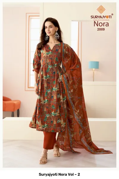Suryajyoti Nora Vol – 2 rust-colored printed salwar suit with matching trousers and dupatta.