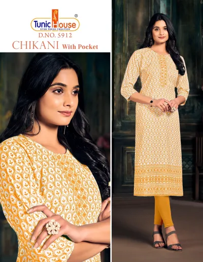 Tunic House Chikani 5912: A yellow and white printed straight-cut kurti with Chikankari-style thread work embroidery and side pockets.