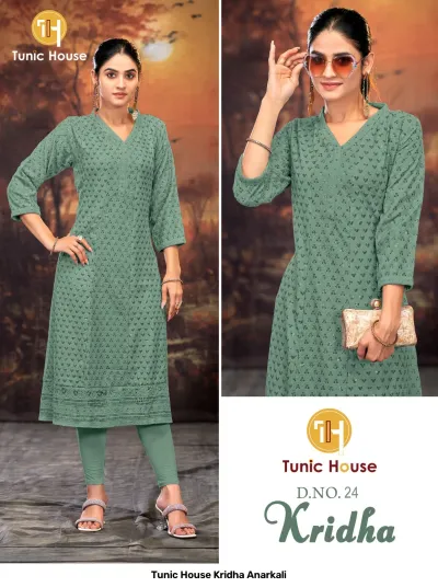 Tunic House Kridha Anarkali: Sage green kurti with all-over thread work and sequin embellishments, V-neck design, styled with matching leggings.