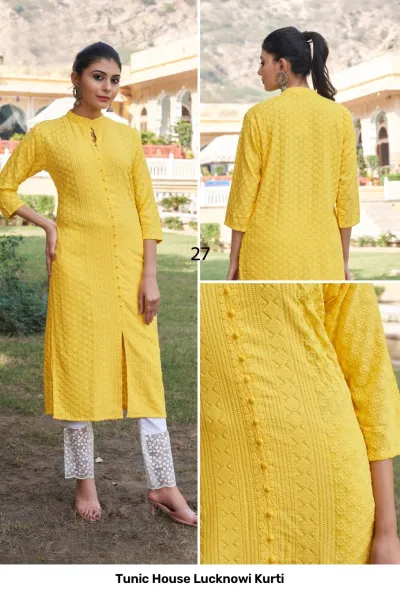 Tunic House Lucknowi Kurti: Yellow kurti with white lacy trousers, featuring delicate tonal thread work, button-down front, and textured panels.