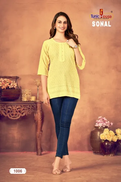Tunic House Sonal Short Tops, yellow kurti with thread work and button detail.