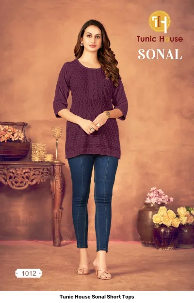 Tunic House Sonal Short Tops, purple kurti with thread work and button detail.