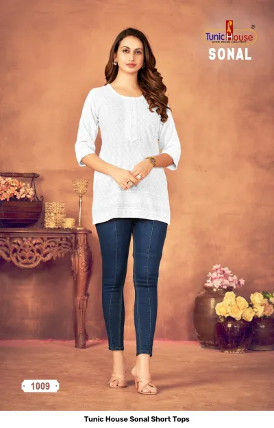 Tunic House Sonal Short Tops, white kurti with thread work and button detail.