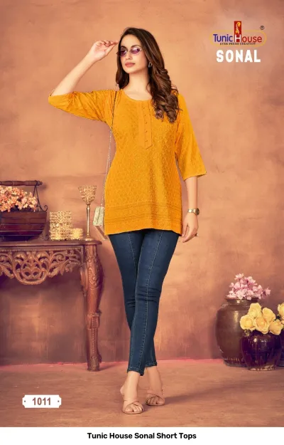 Tunic House Sonal Short Tops, mustard yellow kurti with thread work and button detail.